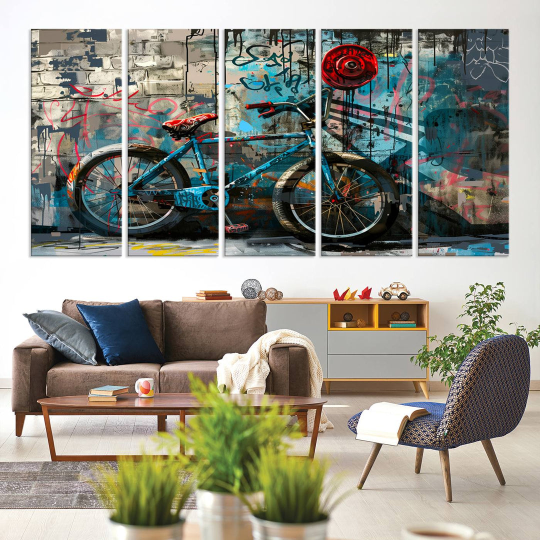 A modern living room features a triptych wall art of an abstract bicycle, designed in a graffiti style on a brick wall. This piece is expertly crafted on the Abstract Bicycle Wall Art Canvas Print, offering a premium canvas that ensures a gallery-quality finish.