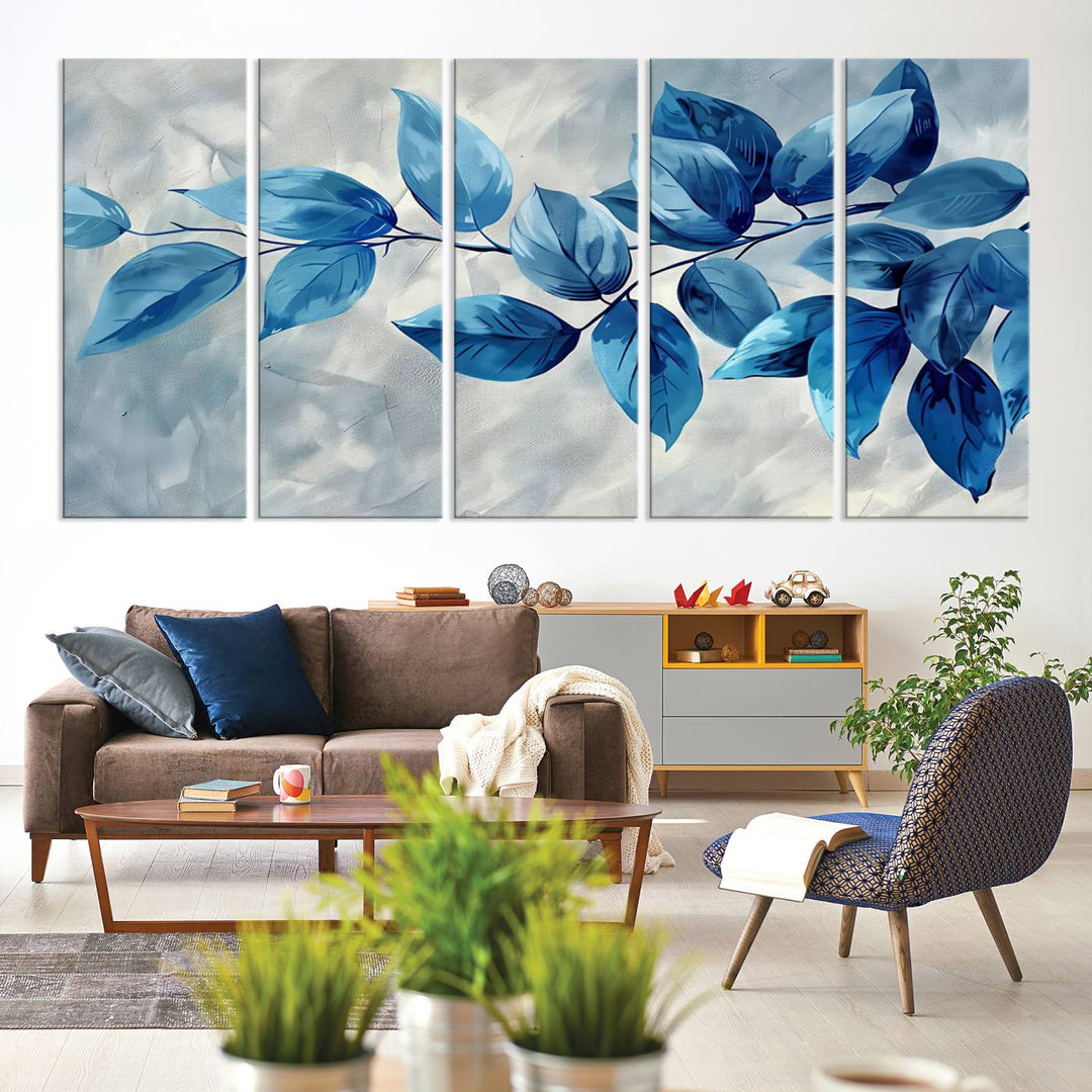 A Blue Leaf Abstract Wall Art Canvas Print, featuring a textured background and gallery-quality finish, is displayed.