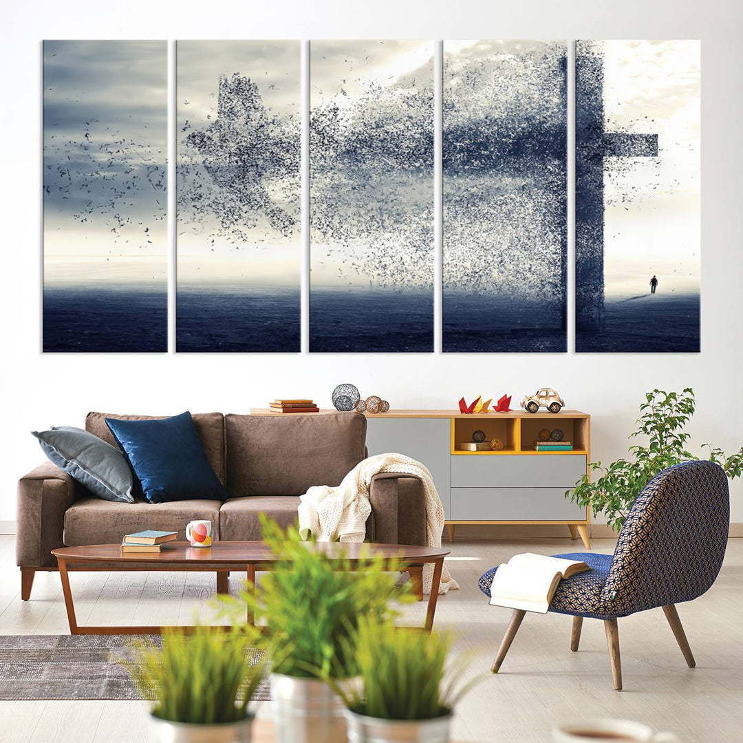 The "Jesus and the Fading Cross – Symbol of Faith" framed canvas print beautifully depicts a cross formed by birds against a moody sky above an ocean. This piece of Christian wall art infuses spirituality into the minimalist space.