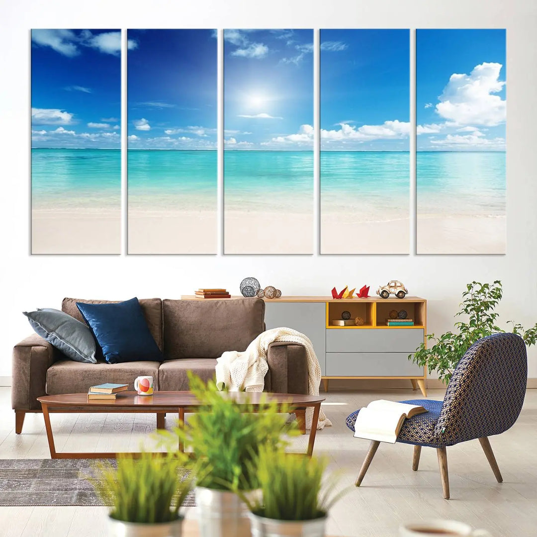 A contemporary living room showcasing the Wall Art Canvas Light Blue Beach and Ocean View.