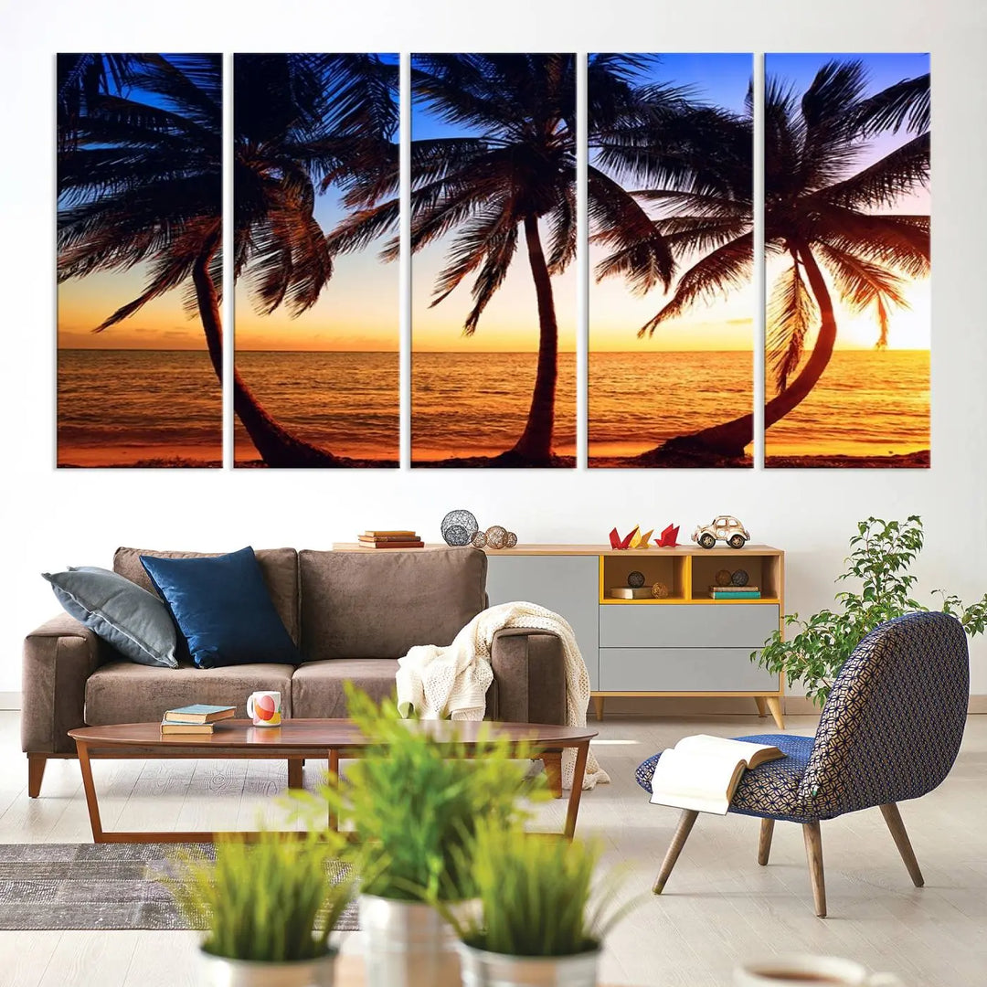 The living room features a wall adorned with the "Wall Art Canvas Curve Palms at Sunset on Beach," showcasing gallery-wrapped, museum-quality canvases in a stunning triptych.