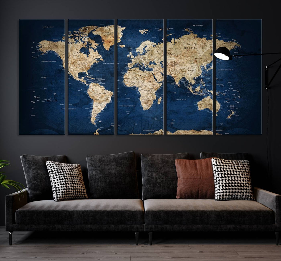 A triptych canvas print titled "Vintage Blue World Map Canvas Print - Classic World Map Design on Deep Blue Wall Art Print" adorns the wall, enhancing the decor with its antique style.