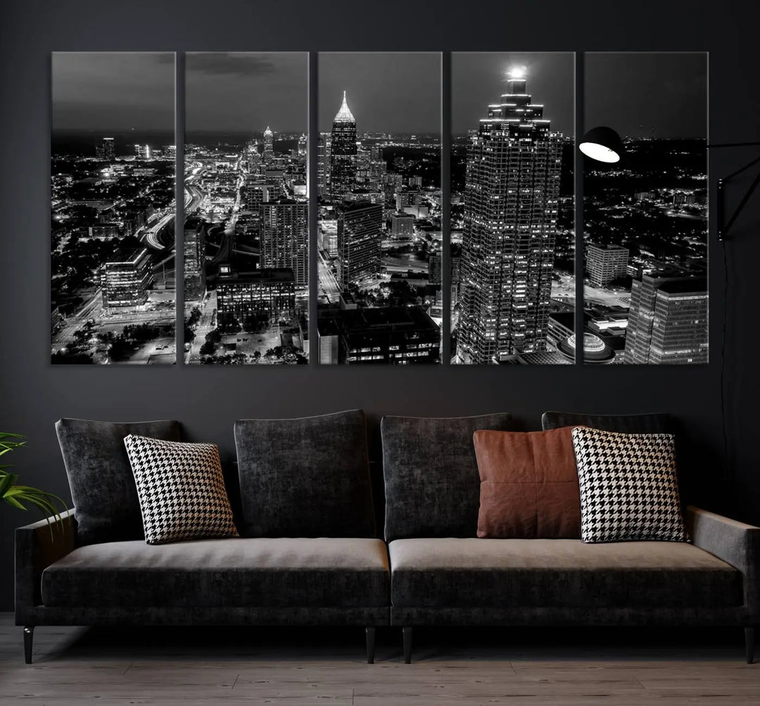 The Atlanta City Lights Skyline Black and White Wall Art Cityscape Canvas Print is elegantly displayed on the wall. These museum-quality canvases arrive ready to hang, making your art display both effortless and sophisticated.