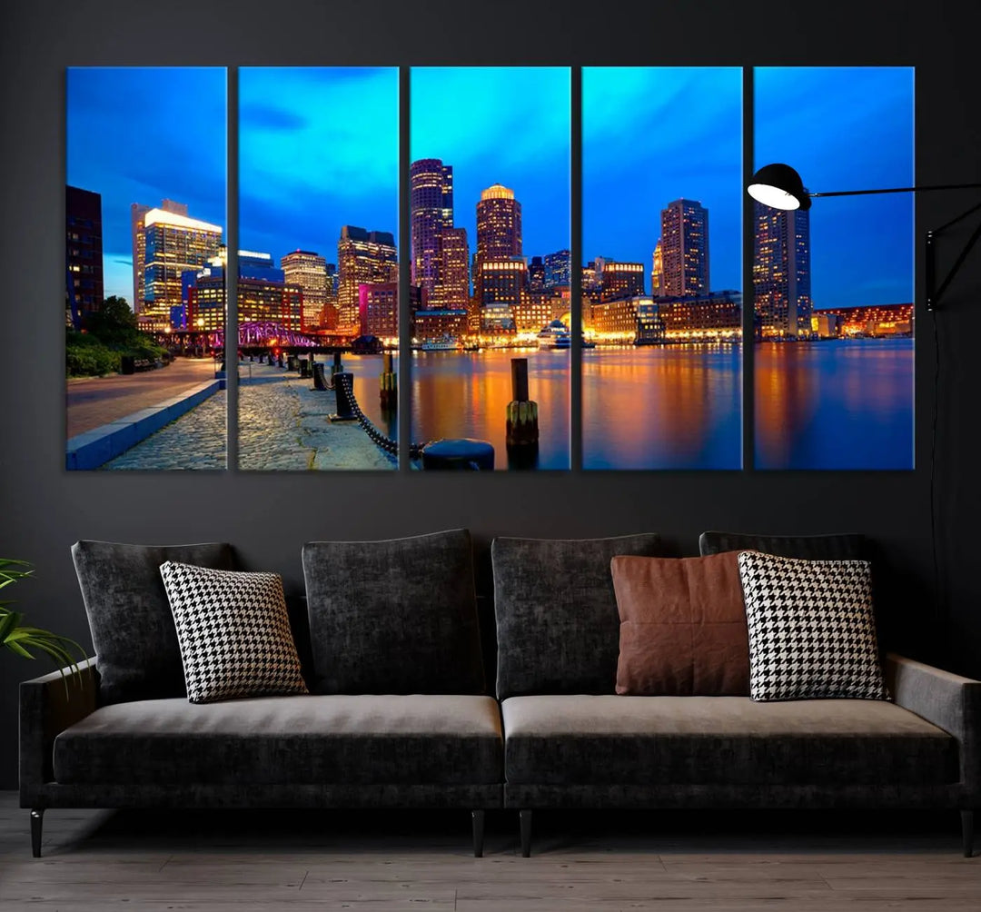 A triptych of the "Boston City Lights Night Blue Skyline Cityscape View Wall Art Canvas Print" adorns the wall. This museum-quality canvas artwork is ready to hang and includes a UV-protective coating for lasting brilliance.