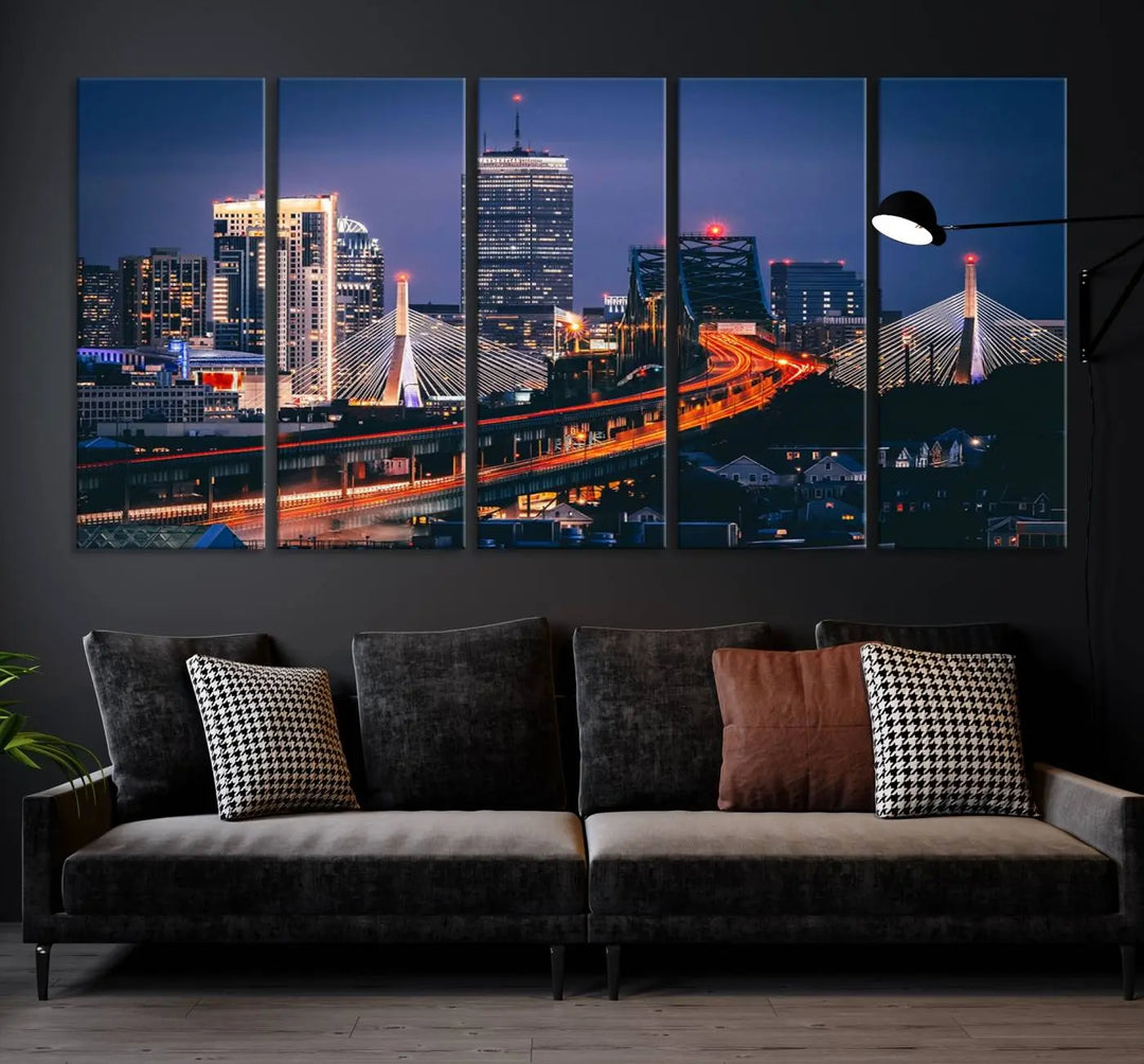 The "Boston City Lights Night Skyline Cityscape View" artwork on the wall showcases a brightly lit bridge at night. It is displayed on museum-quality canvas with a UV-protective coating.