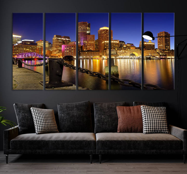 The "Boston City Night Skyline Cityscape View Wall Art Canvas Print" beautifully portrays a stunning triptych of a city skyline illuminated against the night sky, elegantly reflected in the river below. These museum-quality canvases are gallery wrapped to ensure an elegant presentation that enhances any space.