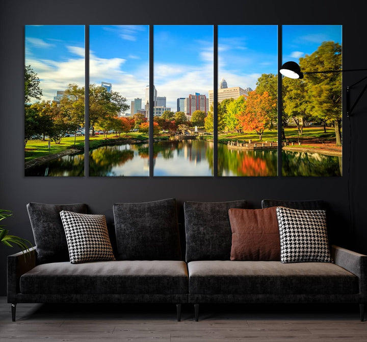 The Charlotte City Park at Spring Skyline Cityscape View wall art canvas print is a triptych featuring a scenic park with a lake and city skyline. It is gallery-wrapped on museum-quality canvases.