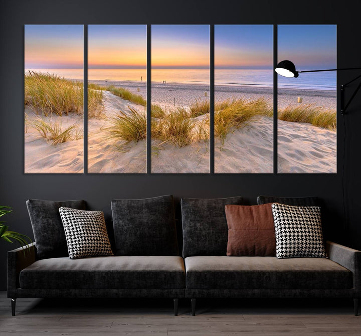 The "Sunset Silence on the Beach" wall art canvas print features a serene beach scene at sunset on museum-quality canvas with a UV-protective coating.