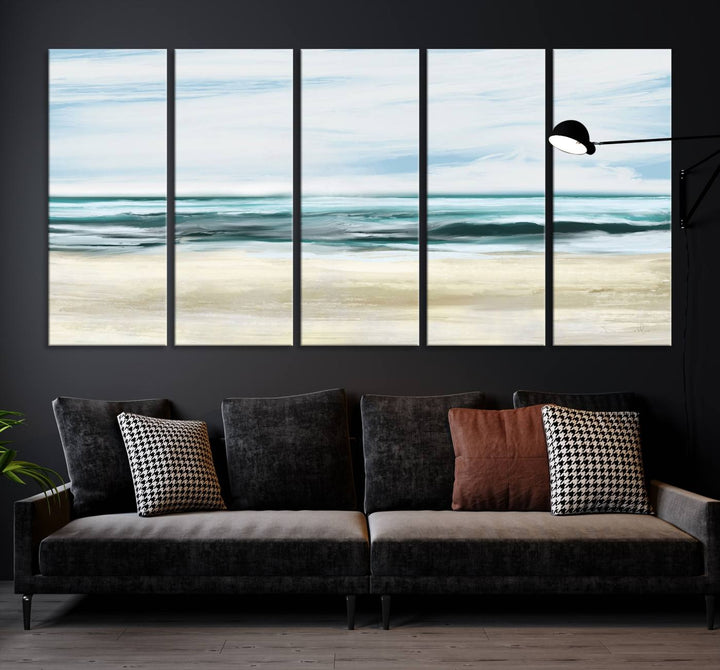 The room features the Ocean Abstract Wall Art Canvas Print, a triptych beach painting on museum-quality canvas with a gallery-wrapped finish and UV-protective coating.