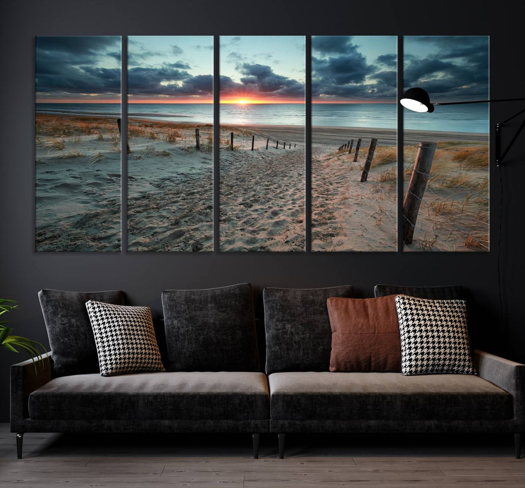 The modern living room features the Cloudy Weather Sunset Beach Wall Art Canvas Print. This museum-quality canvas adds a touch of sophistication with its hand-assembled framed art, ensuring lasting elegance. Enjoy free shipping on this exquisite piece.