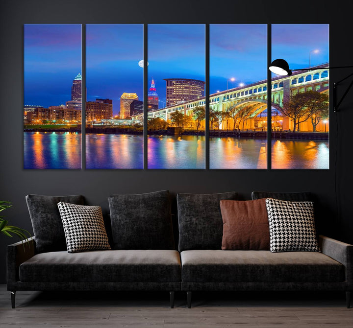 The Cleveland Night Skyline Wall Art City Cityscape Canvas Print portrays a city skyline and bridge lit up against the night sky. This artwork is printed on museum-quality canvas with a gallery-wrapped finish and features a UV-protective coating to ensure lasting vibrancy.