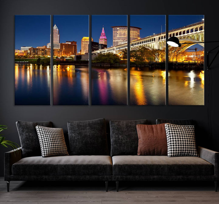 The "Cleveland Night Skyline Wall Art City Cityscape Canvas Print" is a striking feature in the room, showcasing a city skyline with a bridge reflecting in a river. Displayed on museum-quality canvas, it offers enduring beauty.