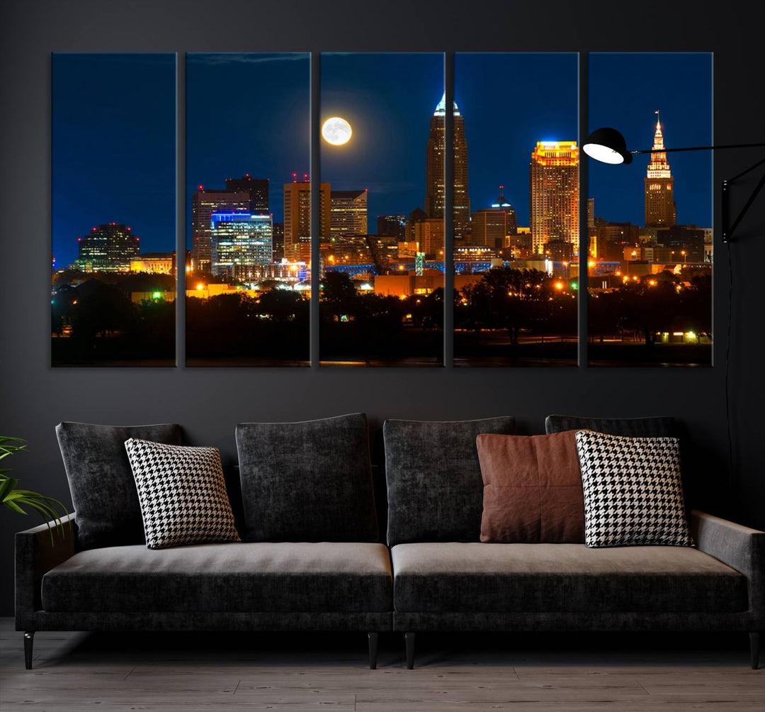 The "Cleveland Night Skyline Wall Art City Cityscape Canvas Print" adds elegance to the room with its depiction of a city skyline and full moon on museum-quality canvas. The artwork is enhanced by a UV-protective coating to ensure lasting brilliance.