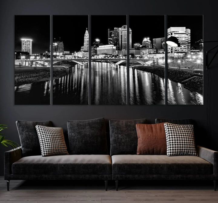 The living room showcases the Columbus City Lights Skyline Black and White Wall Art Cityscape Canvas Print.