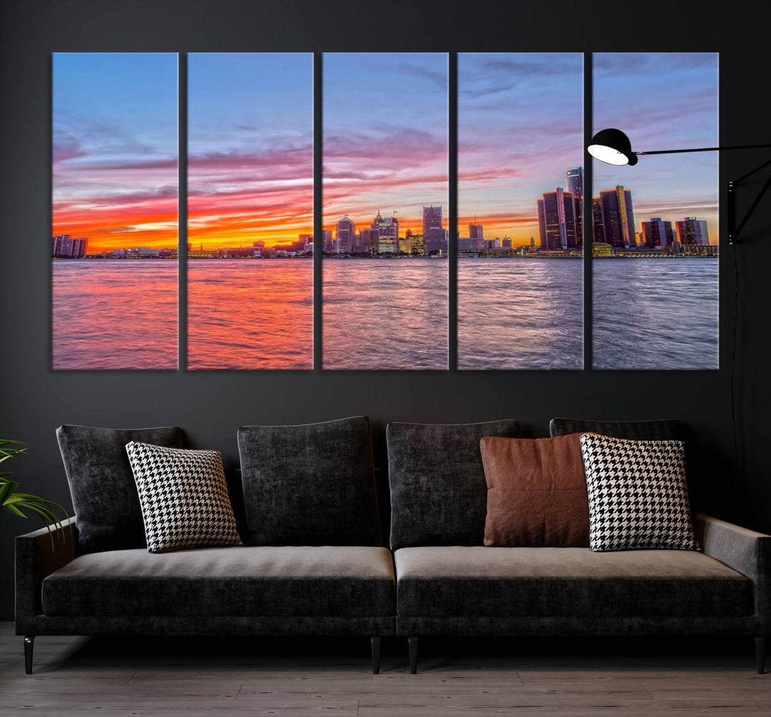 The Detroit City Lights Sunset Colorful Cloudy Skyline Cityscape View Wall Art Canvas Print showcases a vibrant city skyline at sunset over water. The artwork is museum-quality, comes ready to hang, and features a UV-protective coating to preserve its vivid colors.