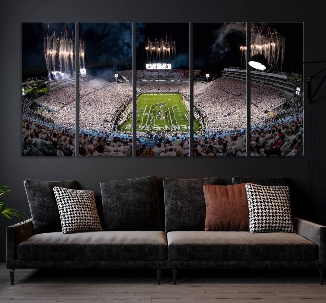 The Penn Stadium Football Wall Art Canvas Print showcases the lively ambiance of a bustling Pennsylvania University football stadium illuminated by fireworks.