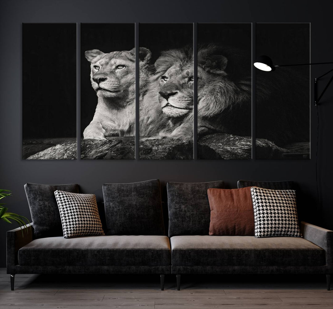 The elegant wildlife portrait, "Lion Couple Canvas Wall Art Print," featuring a black and white depiction of a lion family, majestically decorates the living room wall.