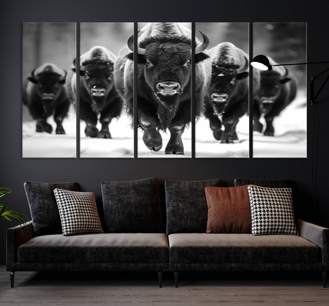 A modern living room features a striking black-and-white American Bison Art | Buffalo Herd Wall Art Canvas Print on the wall.