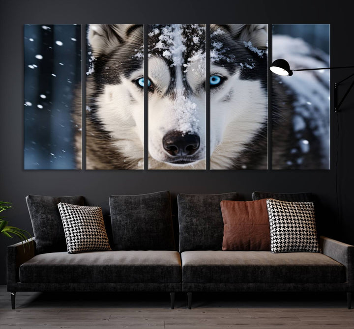 A digital art piece titled "Winter Siberian Husky Wolf Wall Art Canvas Print" showcases a blue-eyed husky blanketed in snow. Printed on high-quality canvas, it is an ideal choice for nature and dog enthusiasts.