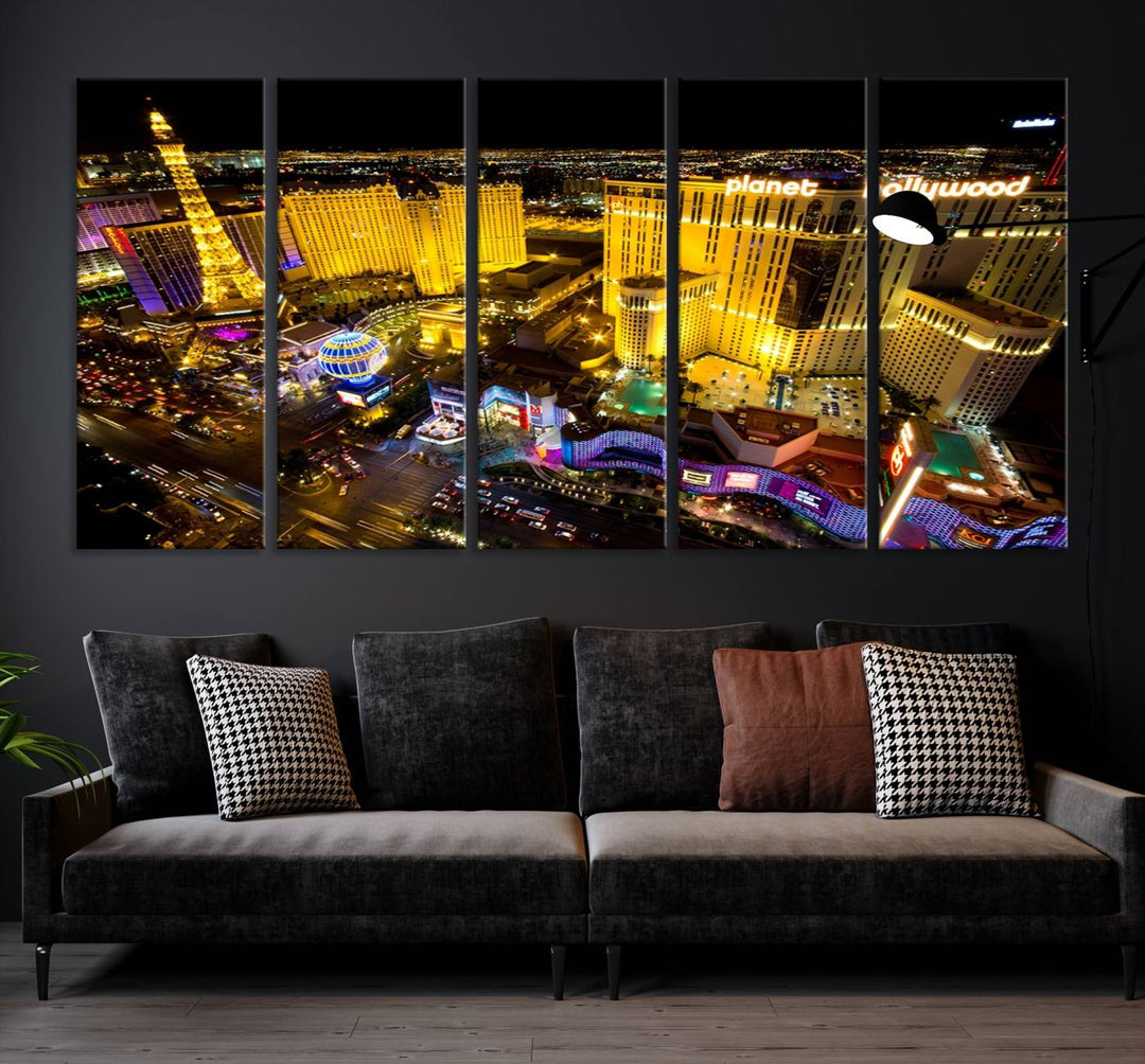 The modern living room features a Las Vegas Wall Art Canvas Print, a museum-quality triptych showcasing a vibrant cityscape with neon lights.