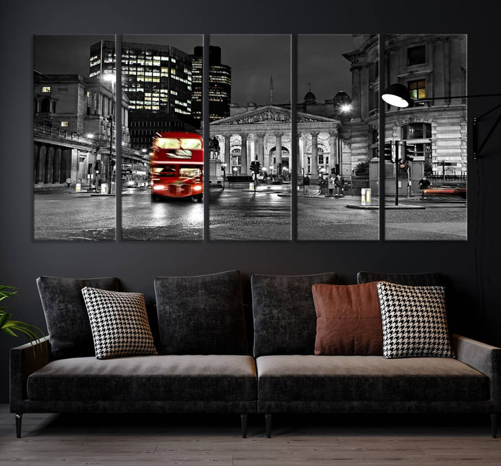 The London Night Red Bus Wall Art Canvas Print features a black and white cityscape with a moving red double-decker bus, crafted on museum-quality canvas with a UV-protective coating. This ready-to-hang artwork is designed to stand out and enhance any space.