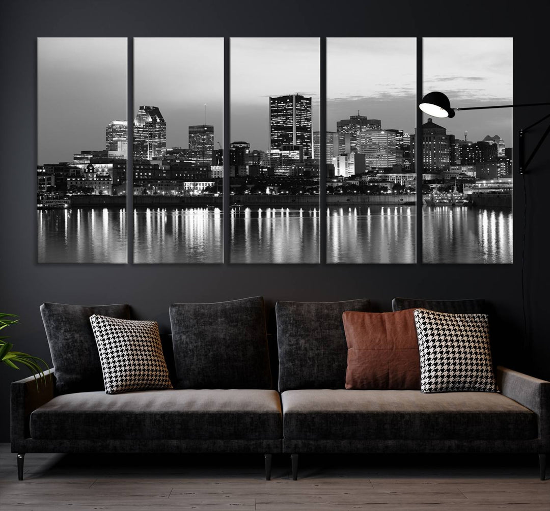 The "Montreal Canada City Wall Art," a black and white triptych of a city skyline at night, elegantly captures the reflections in water.