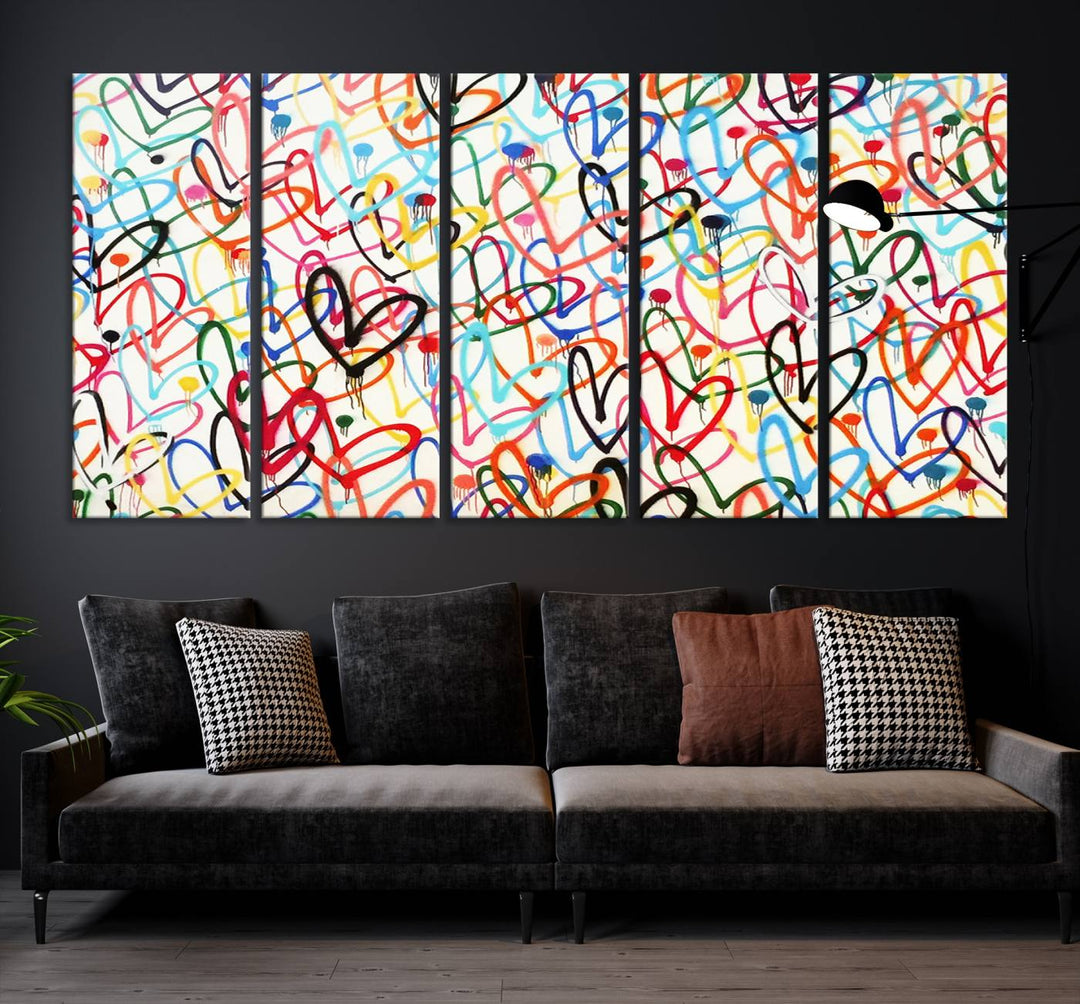 The "Colorful Love Canvas print," featuring vibrant abstract street art with overlapping loops, is handmade in the USA.