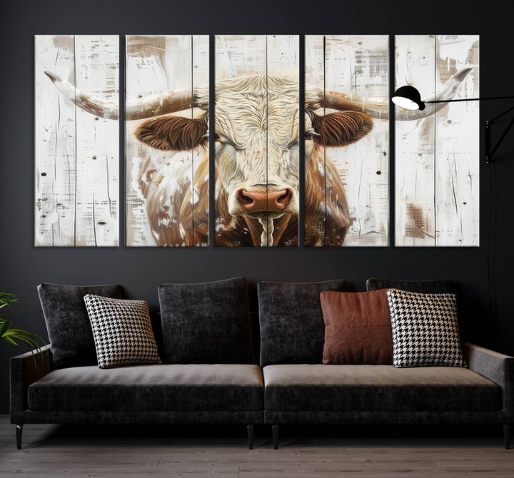 The dimly lit room is enhanced with Western charm by the Rustic Longhorn Bull Wall Art Canvas Set—Western-Inspired Farmhouse Décor, elegantly displayed on the wall.