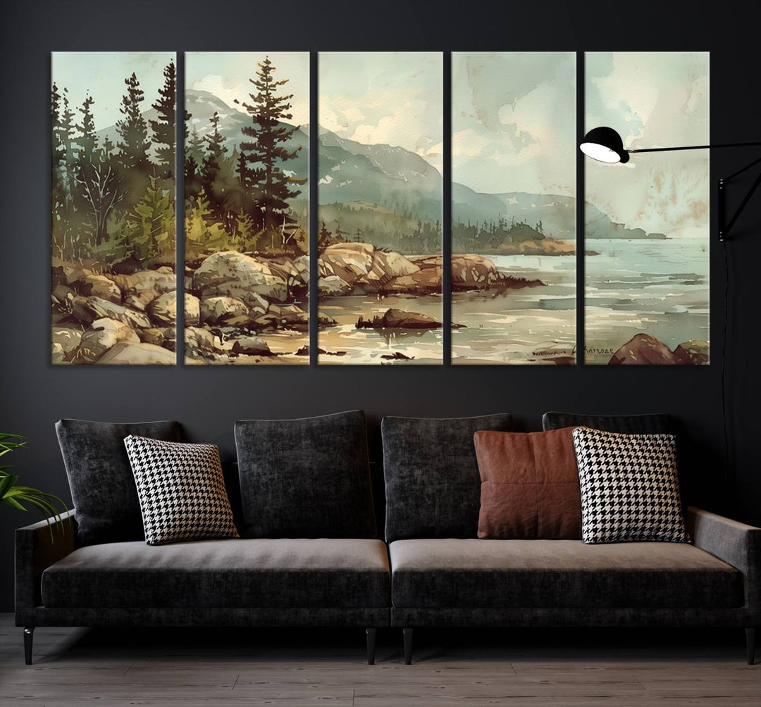 The living room features a breathtaking three-panel Abstract Acadia National Park Wall Art Canvas Print, which beautifully captures the rocky Maine coastline with trees and mountains.