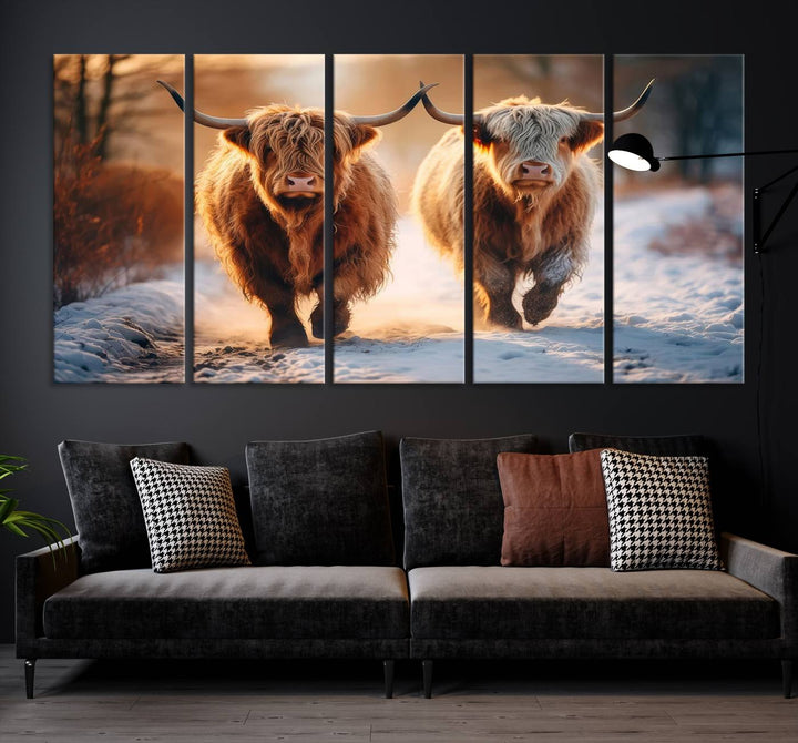 The living room showcases a triptych from the Scottish Highland Cow Horn Farm Wall Art Canvas Print collection, depicting two Highland cows running in the snow. Complementing this are handmade wall art pieces with a gallery-quality finish that add an elegant touch.