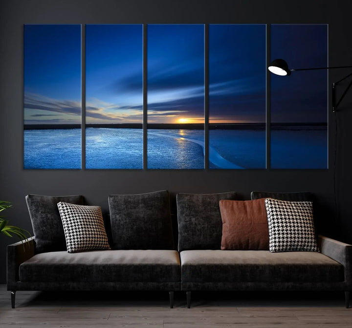 The living room features a triptych of the Wall Art Canvas Print Navy Sunset Lake Landscape Artwork, adding to its tranquil vibe.