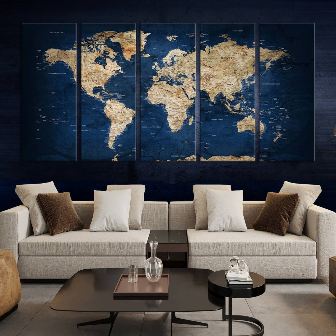 A triptych canvas print titled "Vintage Blue World Map Canvas Print - Classic World Map Design on Deep Blue Wall Art Print" adorns the wall, enhancing the decor with its antique style.