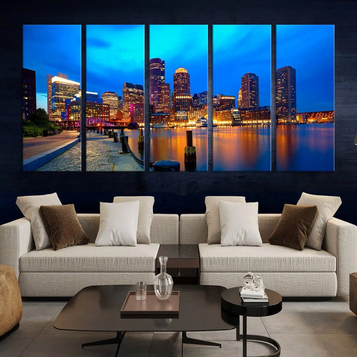 A triptych of the "Boston City Lights Night Blue Skyline Cityscape View Wall Art Canvas Print" adorns the wall. This museum-quality canvas artwork is ready to hang and includes a UV-protective coating for lasting brilliance.