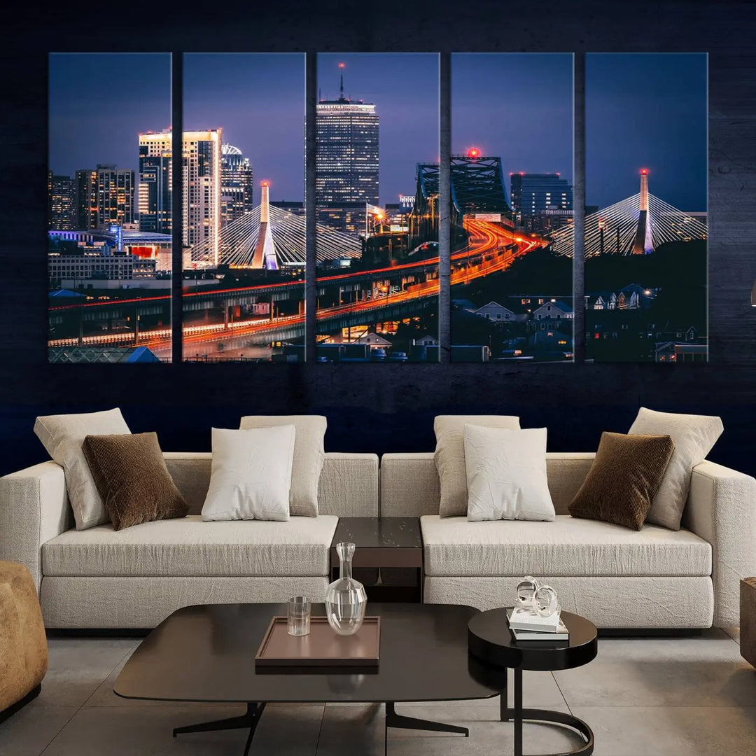 The "Boston City Lights Night Skyline Cityscape View" artwork on the wall showcases a brightly lit bridge at night. It is displayed on museum-quality canvas with a UV-protective coating.