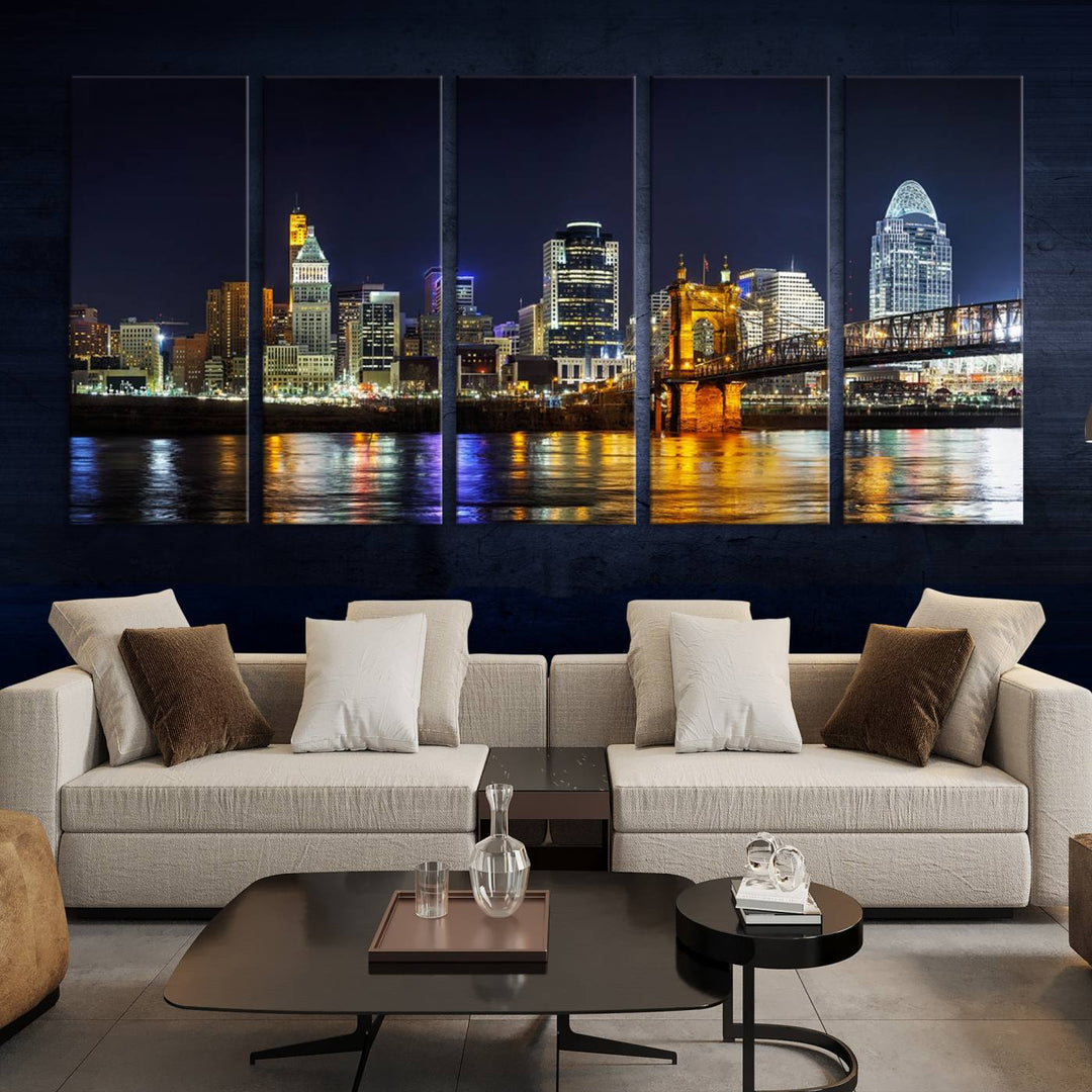 The Cincinnati City Lights Night Skyline Cityscape View Wall Art Canvas Print, crafted on museum-quality canvas with UV-protective coating and ready to hang, adds a touch of sophistication to the wall.