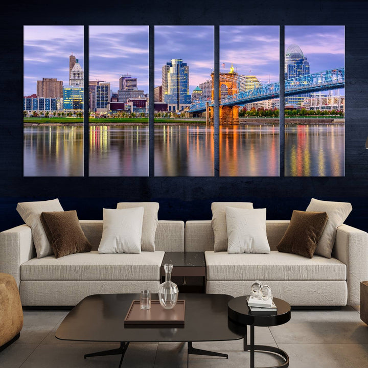 The wall art titled "Cincinnati City Lights Sunset Purple Cloudy Skyline Cityscape View" is beautifully printed on museum-quality canvases with a UV-protective coating and is ready to hang.