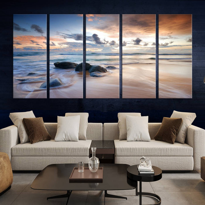 The "Serene Weather On The Beach Wall Art Canvas Print," featuring a tranquil beach scene with rocks and waves, is ready to hang and enjoy.