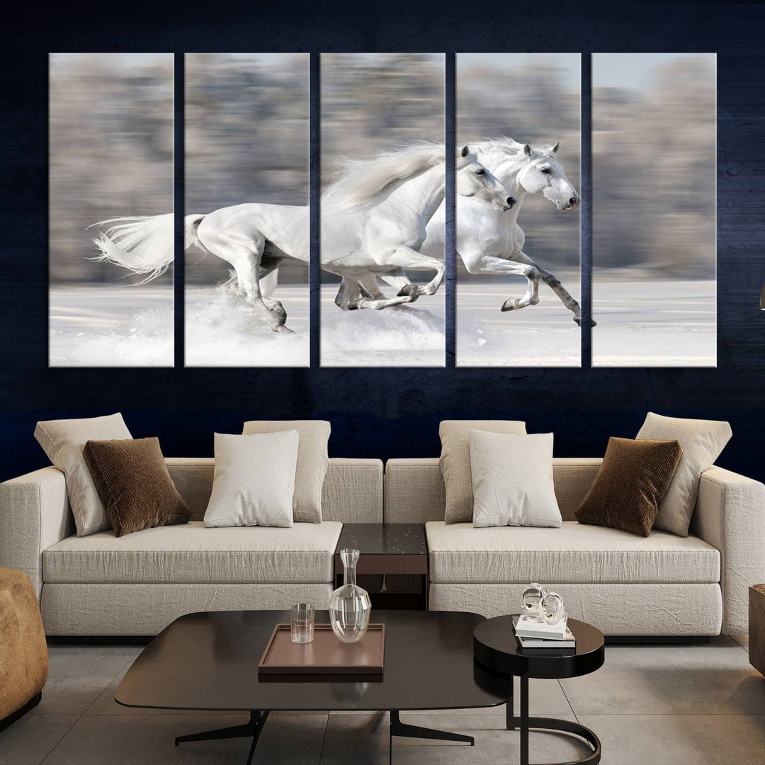 The "All The White Horses Wall Art Canvas Print" depicts a triptych of galloping white horses across a snowy landscape. These museum-quality canvases come with a UV-protective coating to maintain their stunning appearance over time.