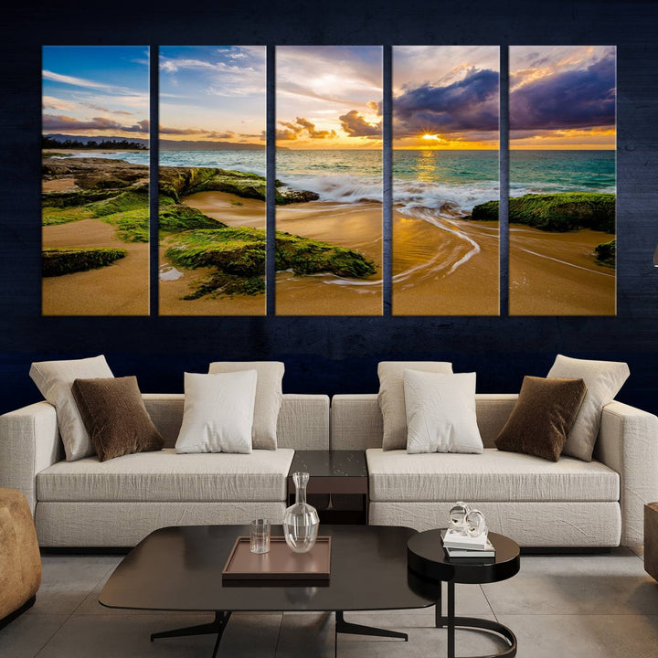 The Sunset Beach Wall Art Canvas Print is a gallery-wrapped triptych showcasing a beach scene with mossy rocks and a vibrant sunset. Made from museum-quality canvas and featuring a UV-protective coating, it elegantly provides both beauty and durability.