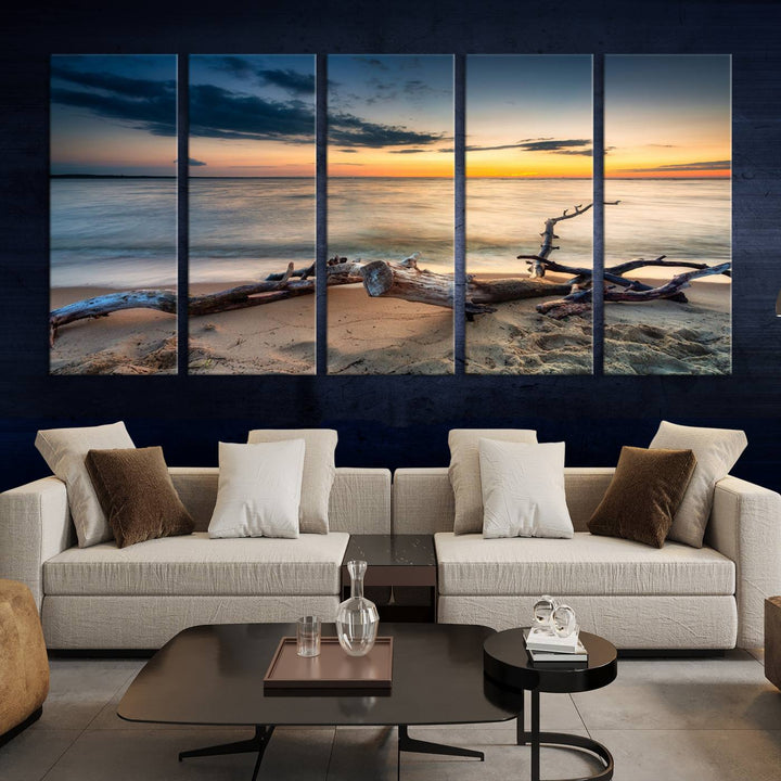 A captivating piece of Ocean Sunset Beach Wall Art Canvas Print, gallery wrapped, graces the gray wall.