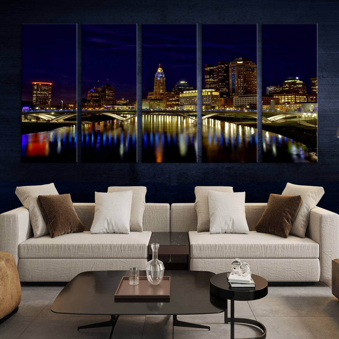 The "Columbus City Lights Night Skyline Cityscape View Wall Art Canvas Print" showcases a stunning city skyline at night, with illuminated buildings and bridges reflecting in the river, on a museum-quality canvas ready to hang.