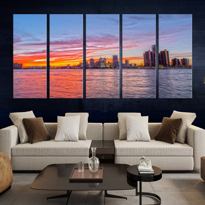 The Detroit City Lights Sunset Colorful Cloudy Skyline Cityscape View Wall Art Canvas Print showcases a vibrant city skyline at sunset over water. The artwork is museum-quality, comes ready to hang, and features a UV-protective coating to preserve its vivid colors.