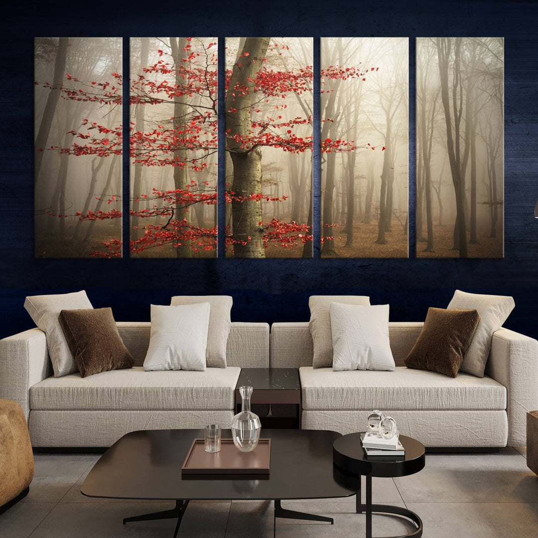 The living room features the Foggy Forest Wall Art, an Autumn Trees Canvas Print that showcases a serene nature scene with foggy woodland decor and a tree adorned in vibrant red leaves.