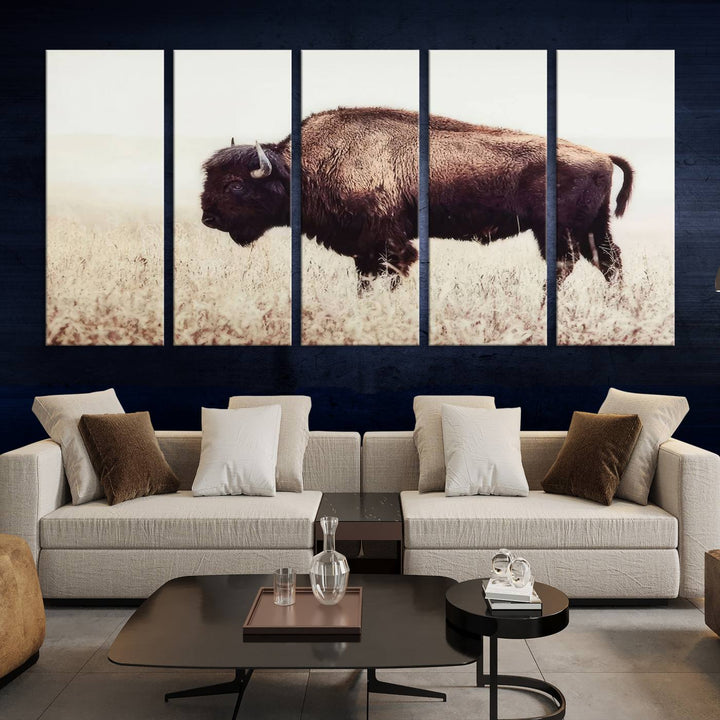 A stylish living room showcases the captivating "Bison in Field" Wall Art Canvas Print as farmhouse decor.