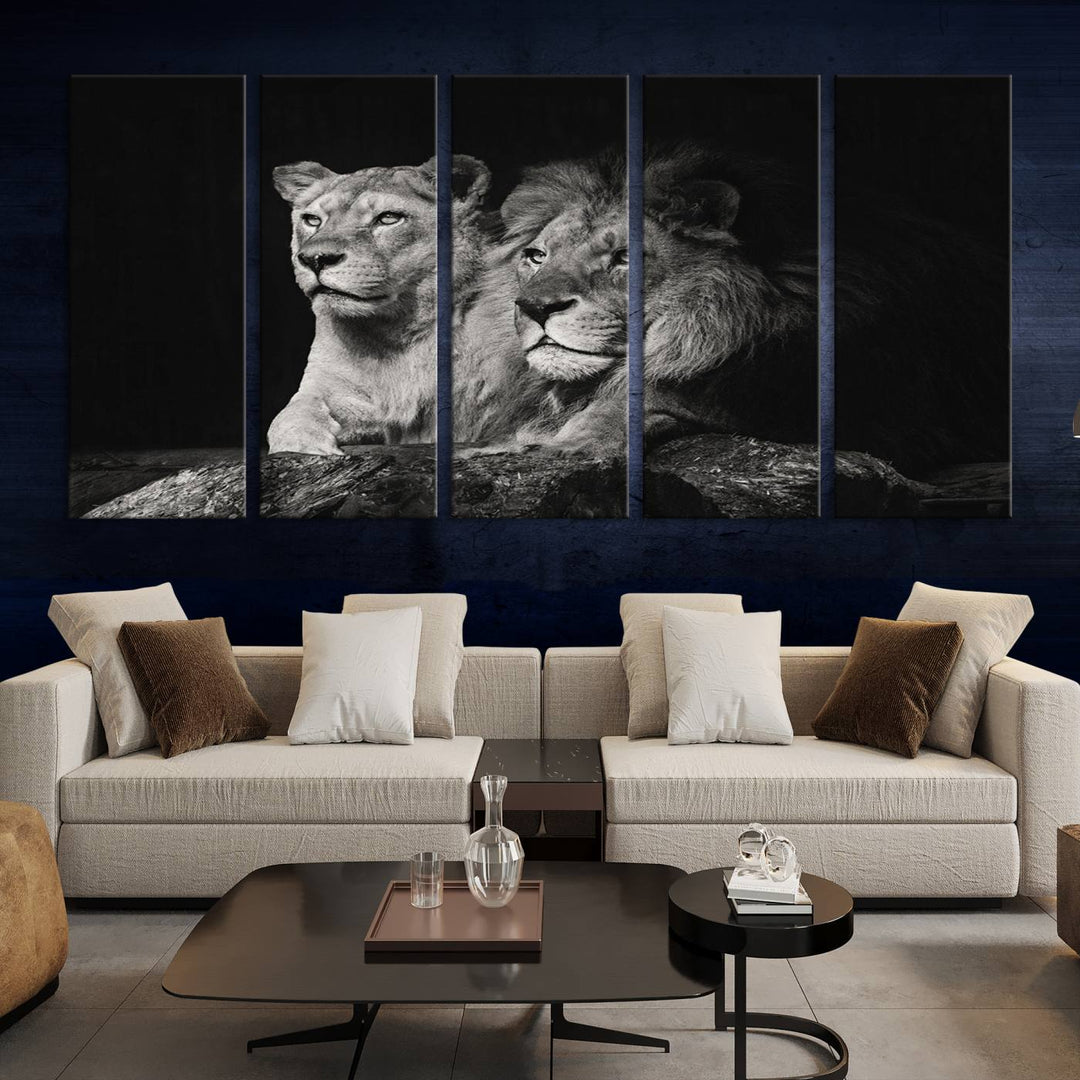 The elegant wildlife portrait, "Lion Couple Canvas Wall Art Print," featuring a black and white depiction of a lion family, majestically decorates the living room wall.