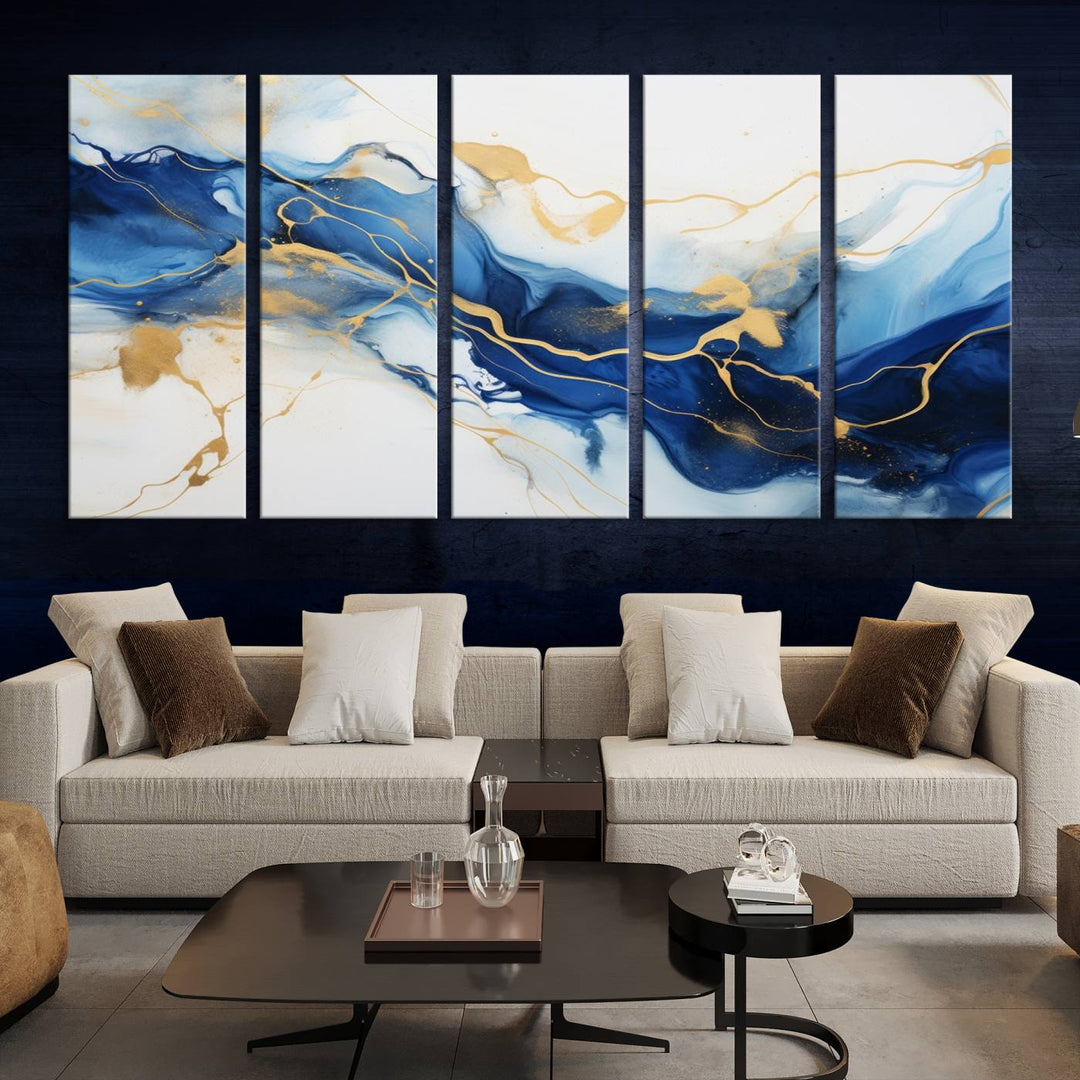 The Blue Abstract Wall Art is displayed as a triptych on museum-quality canvas, showcasing a blue and gold abstract design. The artwork includes a UV-protective coating to maintain its vibrancy and comes with the benefit of free shipping.