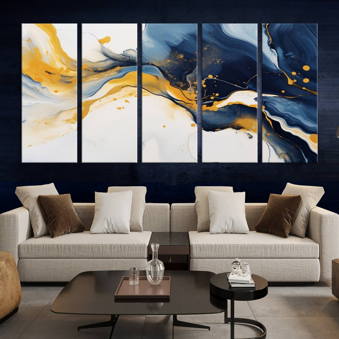 The Blue and Gold Abstract Fluid Canvas Art, with its swirling patterns, adorns the wall. This modern wall art beautifully complements the contemporary interior decor, adding an elegant touch with its rich blue, gold, and white tones.