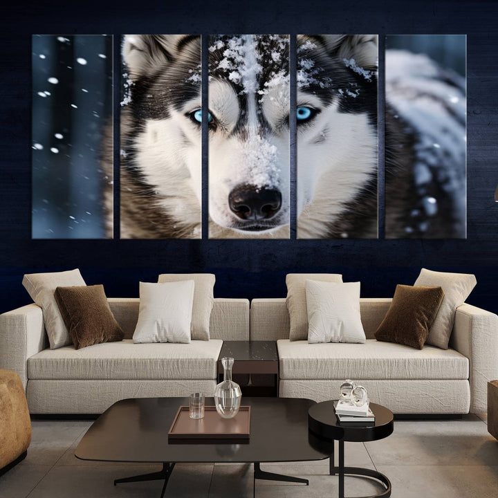 A digital art piece titled "Winter Siberian Husky Wolf Wall Art Canvas Print" showcases a blue-eyed husky blanketed in snow. Printed on high-quality canvas, it is an ideal choice for nature and dog enthusiasts.