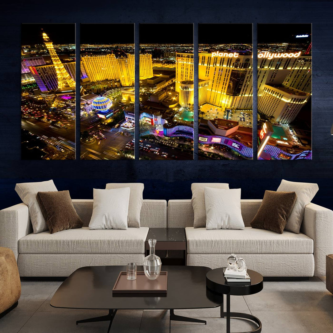 The modern living room features a Las Vegas Wall Art Canvas Print, a museum-quality triptych showcasing a vibrant cityscape with neon lights.