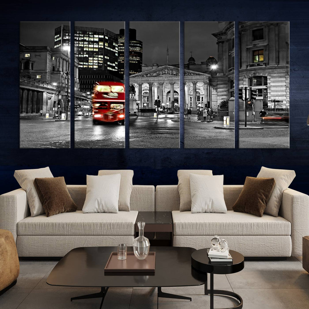 The London Night Red Bus Wall Art Canvas Print features a black and white cityscape with a moving red double-decker bus, crafted on museum-quality canvas with a UV-protective coating. This ready-to-hang artwork is designed to stand out and enhance any space.